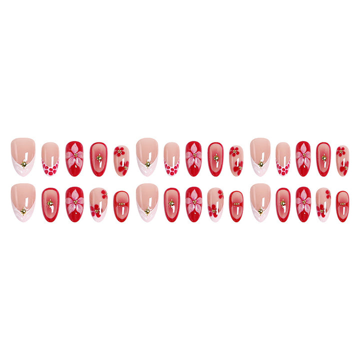 Artificial nails with floral design and glamorous accents Bowlift