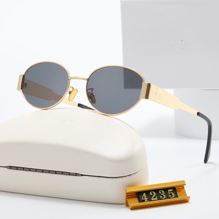 Ladies Elegant Designer Sunglasses with Filigree Frame and UV Protection Bowlift