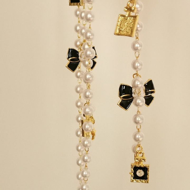 Fashionable glasses holder chain with pearls and pendants Bowlift