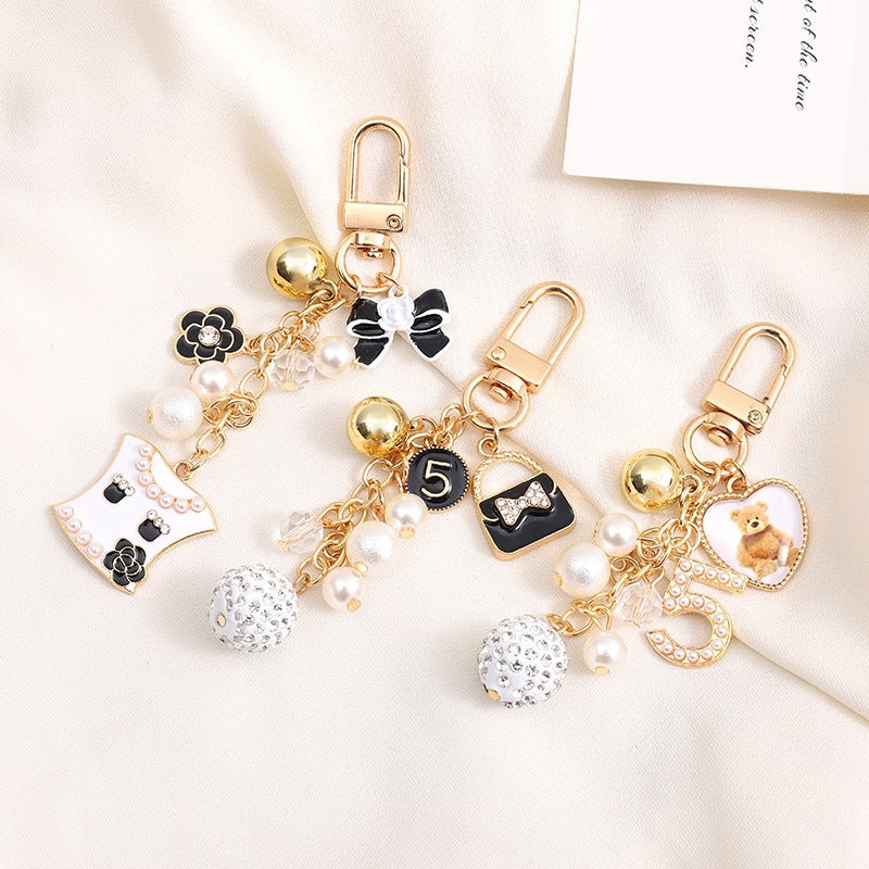 Playful keychain with teddy bear motif Bowlift