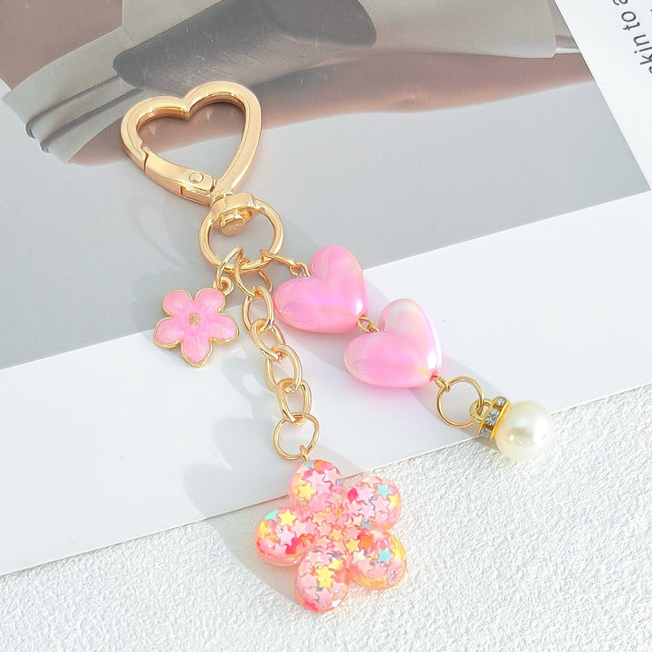 Playful keychain with hearts and flower motif Bowlift
