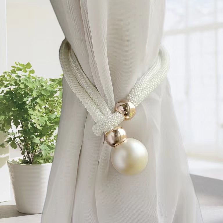 Elegant curtain tieback with decorative pearl Bowlift