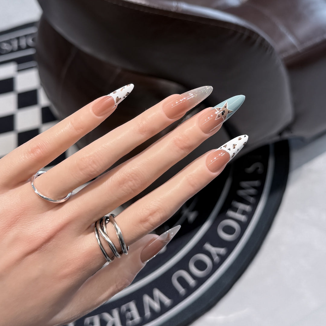 Elegant Stiletto Press-On Nail Set with Artistic Accents Bowlift