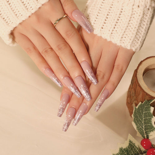 Artful nail art in winter design with glitter and snowflakes Bowlift