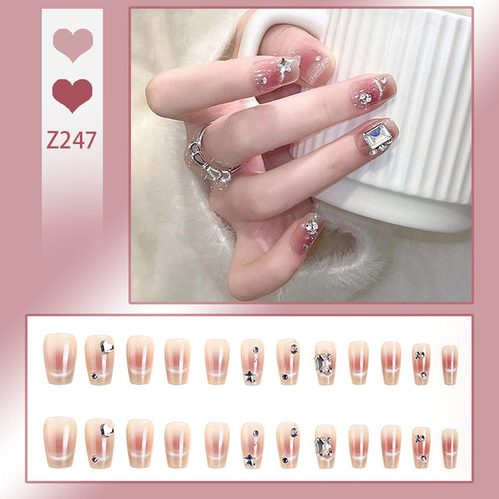 Artificial nail set with elegant glitter and star decorations Bowlift