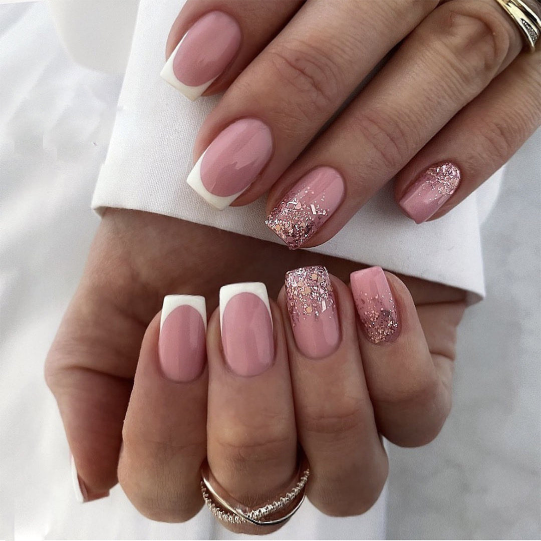 Artful Nail Art with Elegant Glitter and French Tip Accents Bowlift