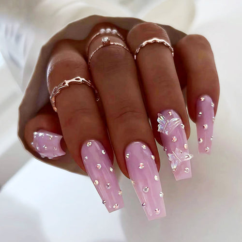 Artistic nail extensions with rhinestone and butterfly adornments Bowlift