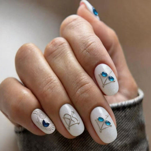 Artificial nails with noble glitter accents and symbol motif Bowlift