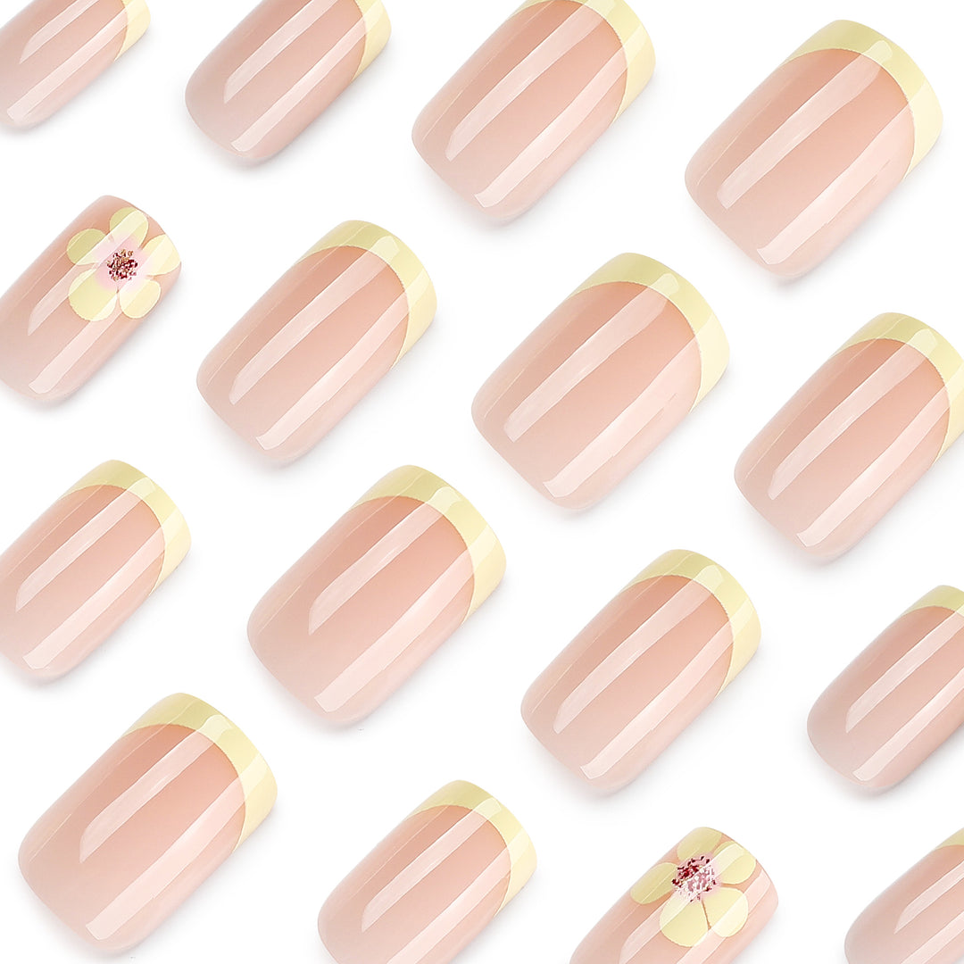 Artistic French-tip nails with floral decorations Bowlift