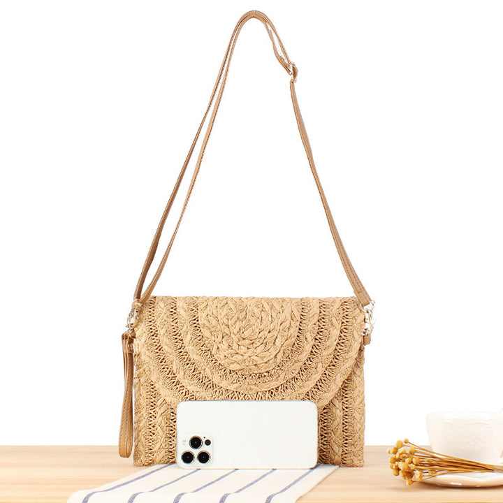 Shoulder bag made of braided straw with structured design Bowlift