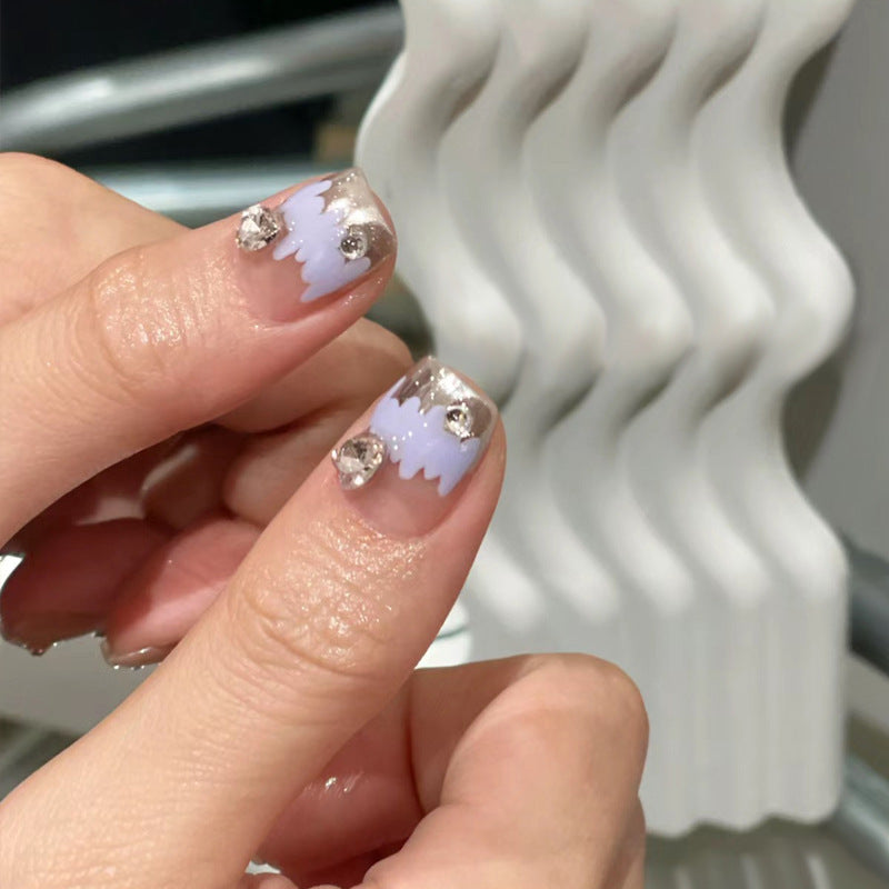 Artistic Press-On Nail Set with Floral and Heart Designs Bowlift