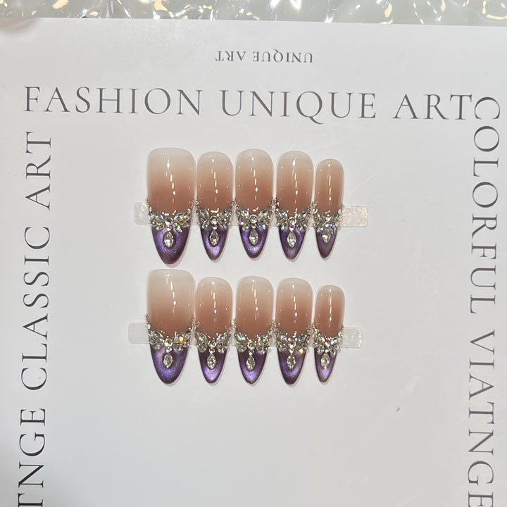 Elegant Stiletto Press-On Nail Set with Gemstone Embellishments Bowlift