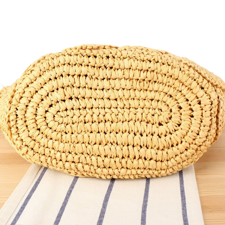 Hand-knotted beach bag with decorative motif Bowlift