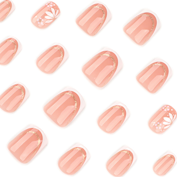 Artistic nail extensions with floral design and elegant accents Bowlift