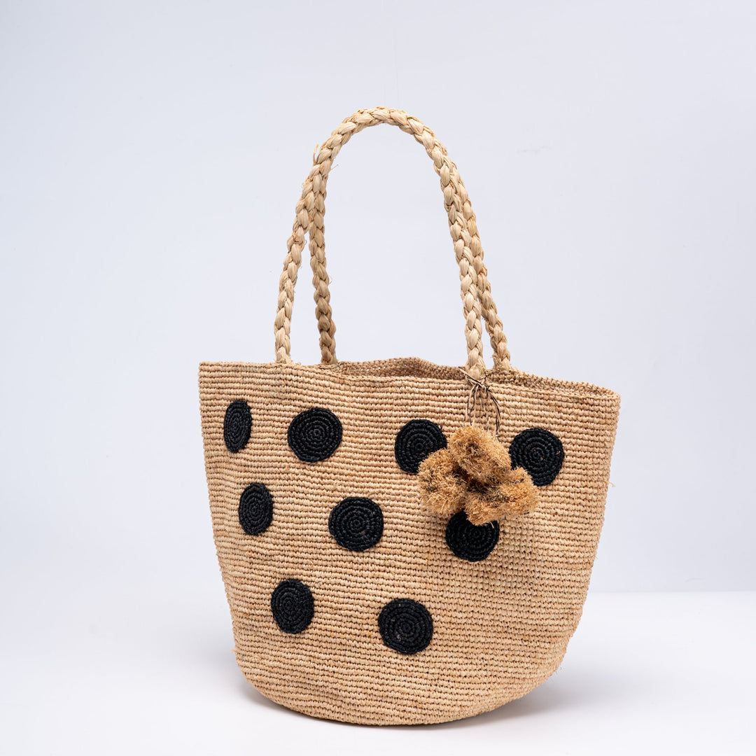 Handcrafted straw bag with eye-catching accents Bowlift