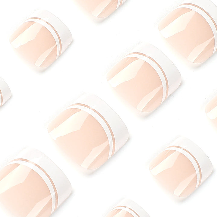 Artful toenail art with elegant French tip design Bowlift