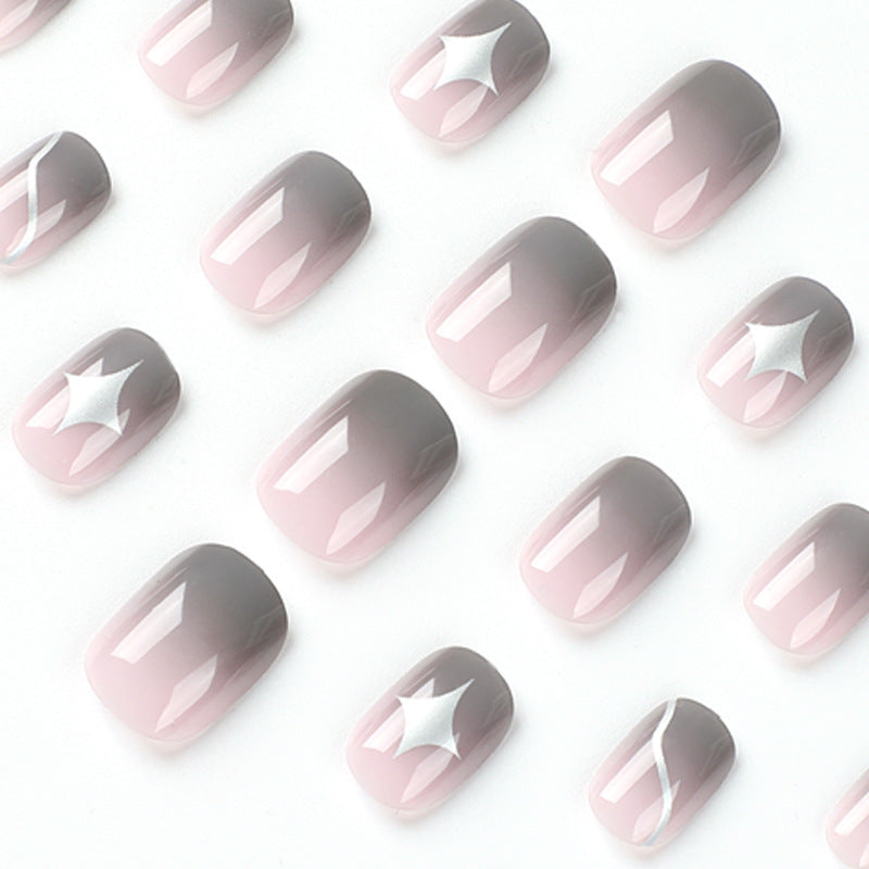 Artificial nail art with elegant ombre design and charming accents Bowlift