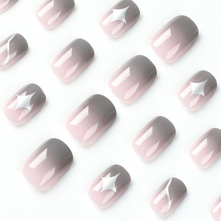 Artificial nail art with elegant ombre design and charming accents Bowlift