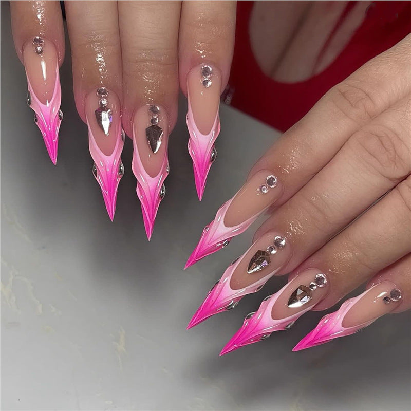 Artistic Stiletto Press-On Nail Art with Metallic Accents Bowlift