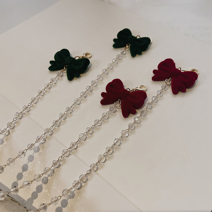 Jewelry holder chain with velvet bow pendant Bowlift