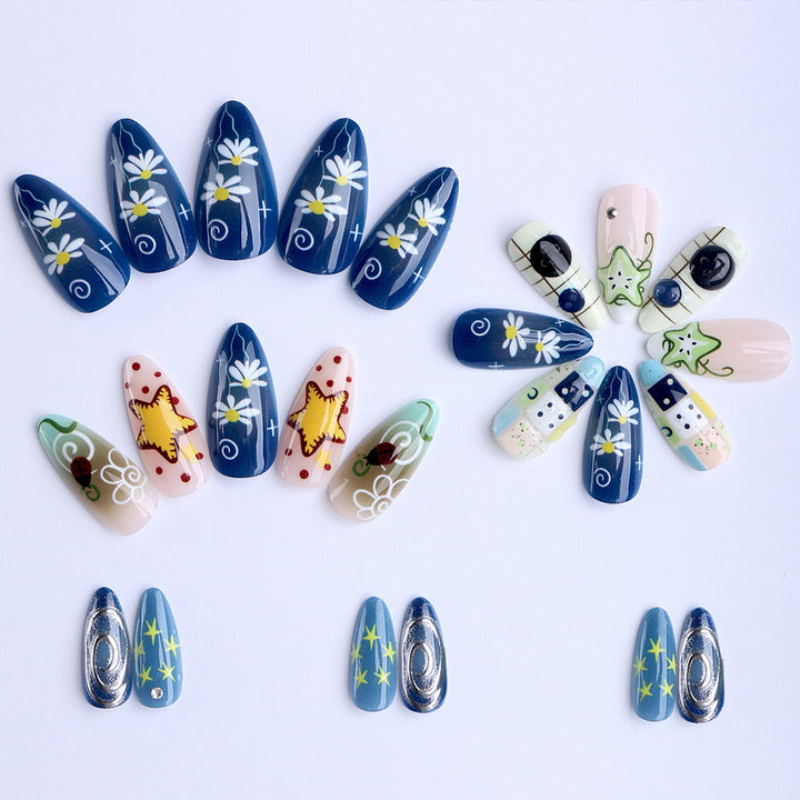 Artificial nails with creative maritime designs and 3D elements Bowlift