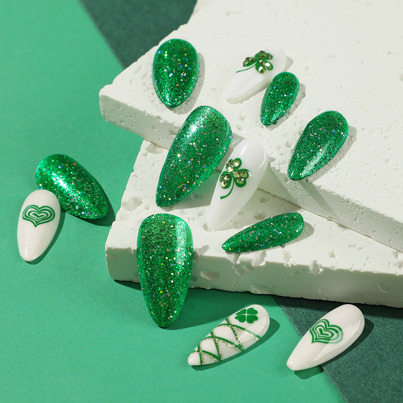 Artistic Stiletto Nails with Glitter and Clover Leaf Designs Bowlift