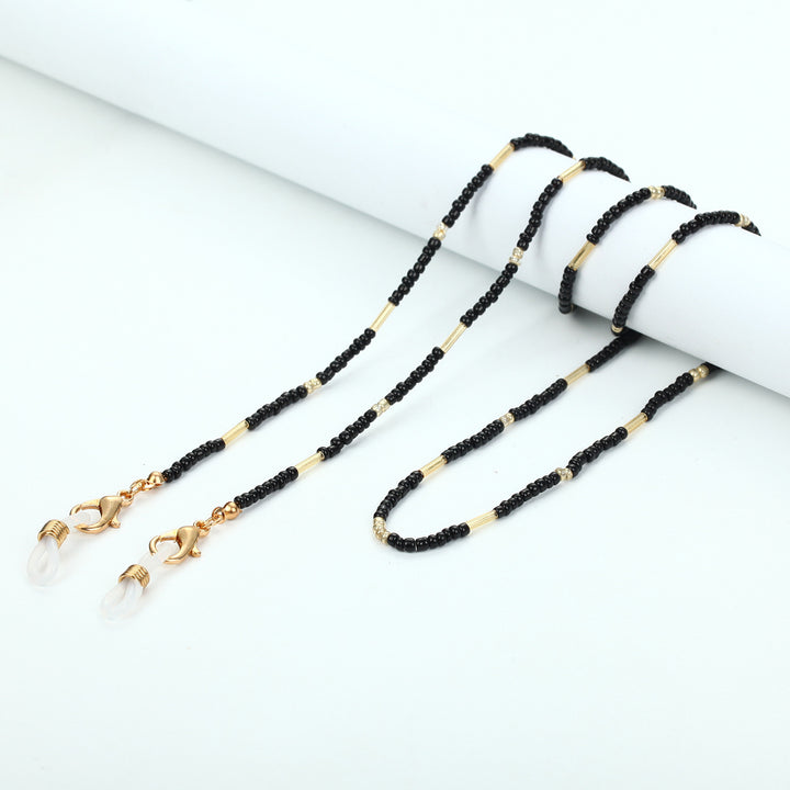 Chains-Necklace Made of Fine Pearls and Golden Accents Bowlift