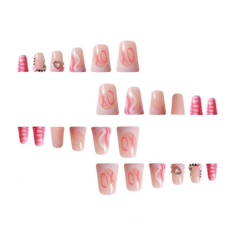 Decorative Press-On Nail Design with Heart and Gem Accents Bowlift