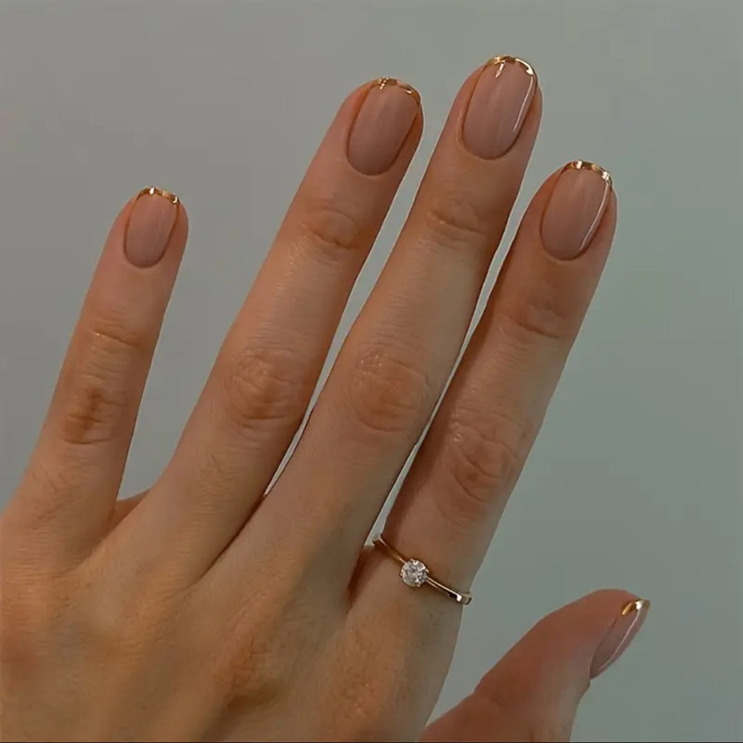 Nail art set with elegant gold accents Bowlift