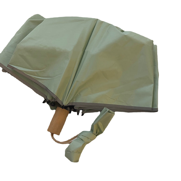 Women's automatic folding umbrella with elegant design and ergonomic wooden handle Bowlift