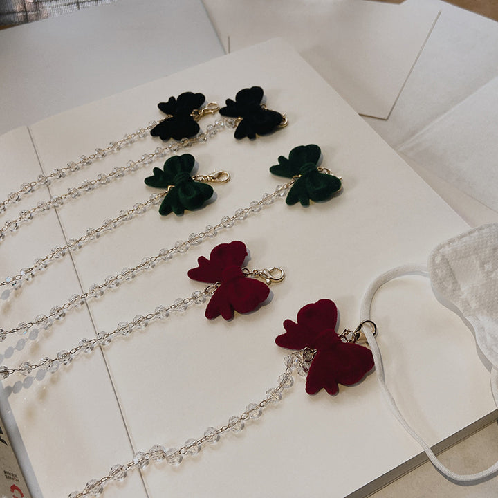 Jewelry holder chain with velvet bow pendant Bowlift