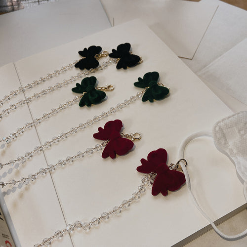 Jewelry holder chain with velvet bow pendant Bowlift