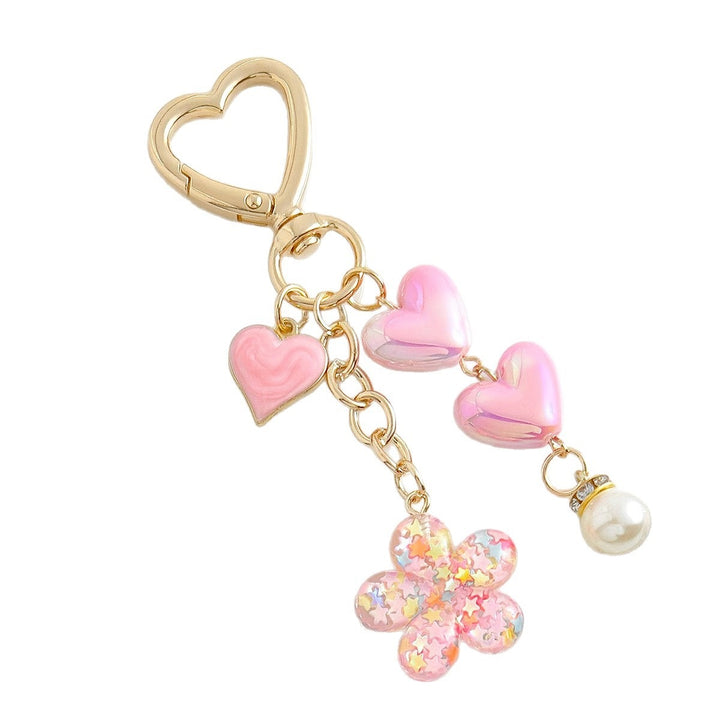 Playful keychain with hearts and flower motif Bowlift