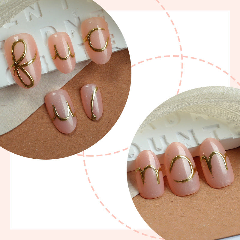 Elegant Press-On Nail Art Set with Stylish Gold Accents Bowlift