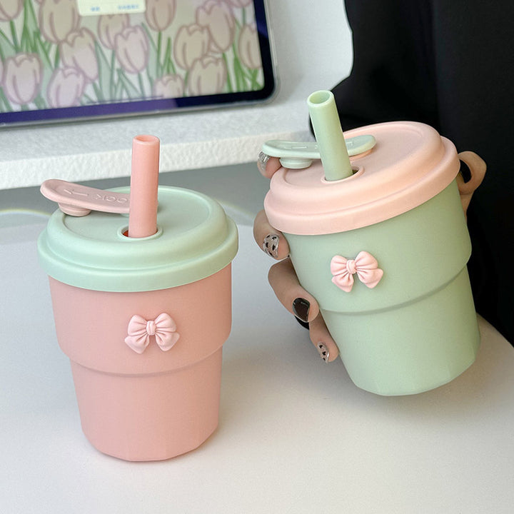 Women's Reusable Drinking Cup with Integrated Straw and Secure Closure Bowlift