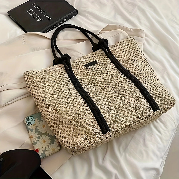 Beach bag made of hand-woven natural material with sturdy handles Bowlift