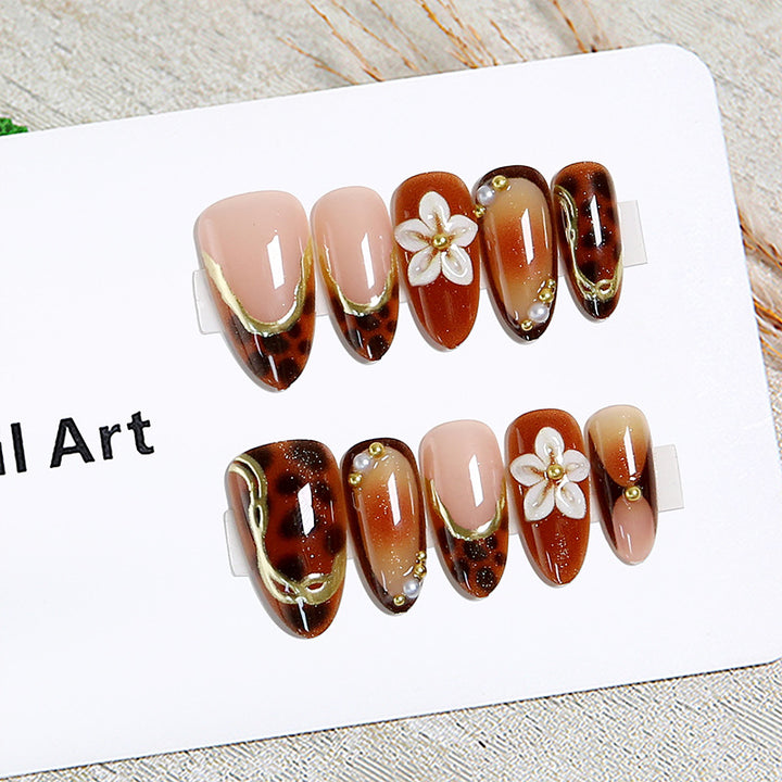 Elegant artificial nails with floral and animal motifs Bowlift
