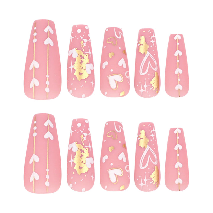 Artificial nail art with heart and glitter designs Bowlift