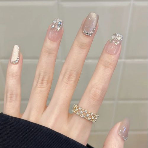 Artificial nails with sweet animal motif and elegant French tip Bowlift