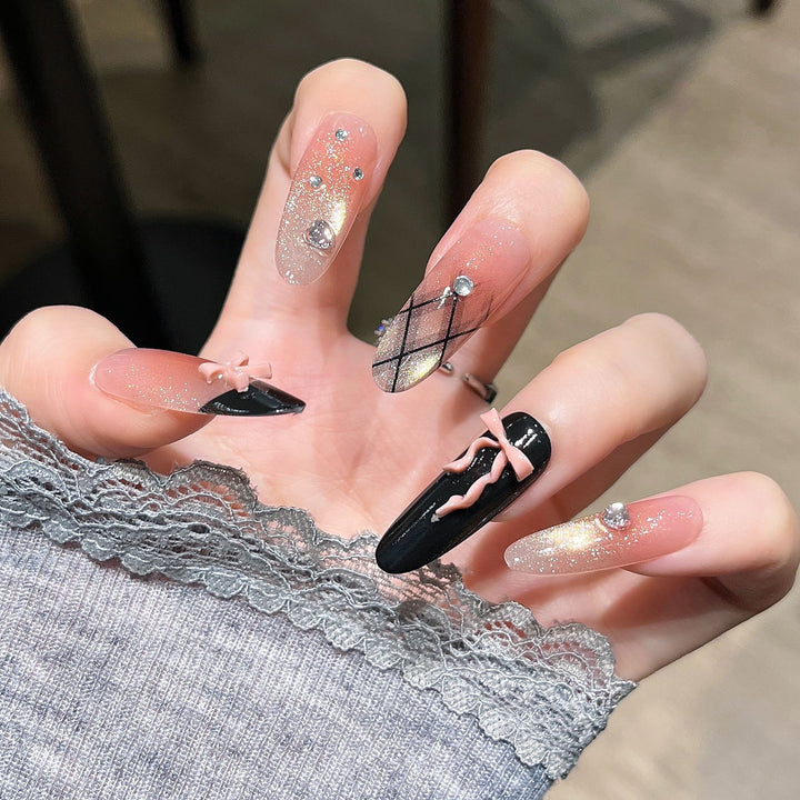 Artistic Nail Design with Decorative Elements Bowlift