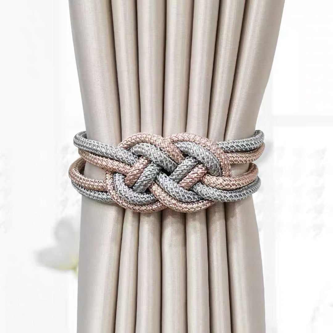 Decorative curtain tieback with braided design Bowlift