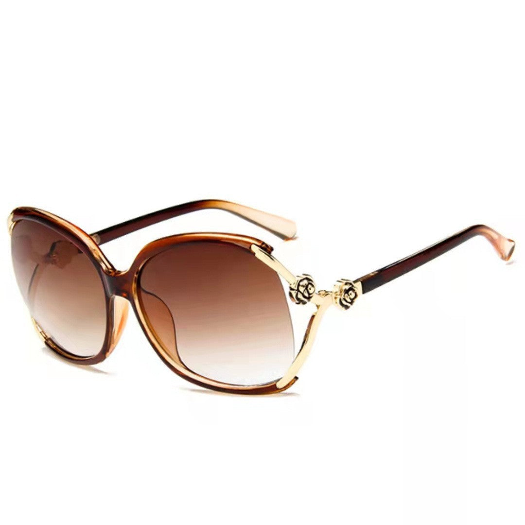 Ladies elegant oversized sunglasses with golden accents Bowlift