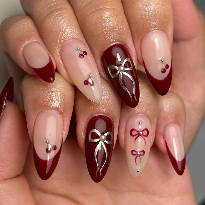Glamorous stiletto nails with delicate accents Bowlift