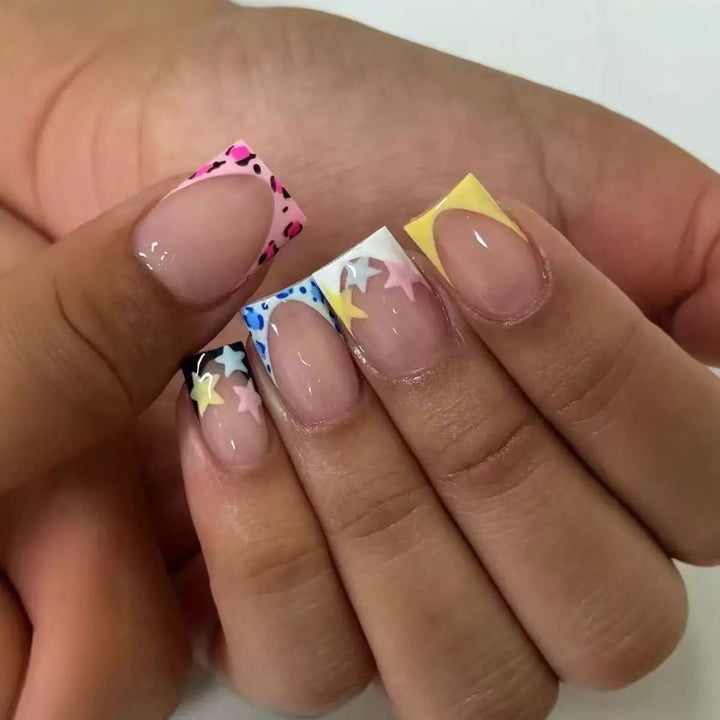 Acrylic nail set with colorful star motifs and modern accents Bowlift
