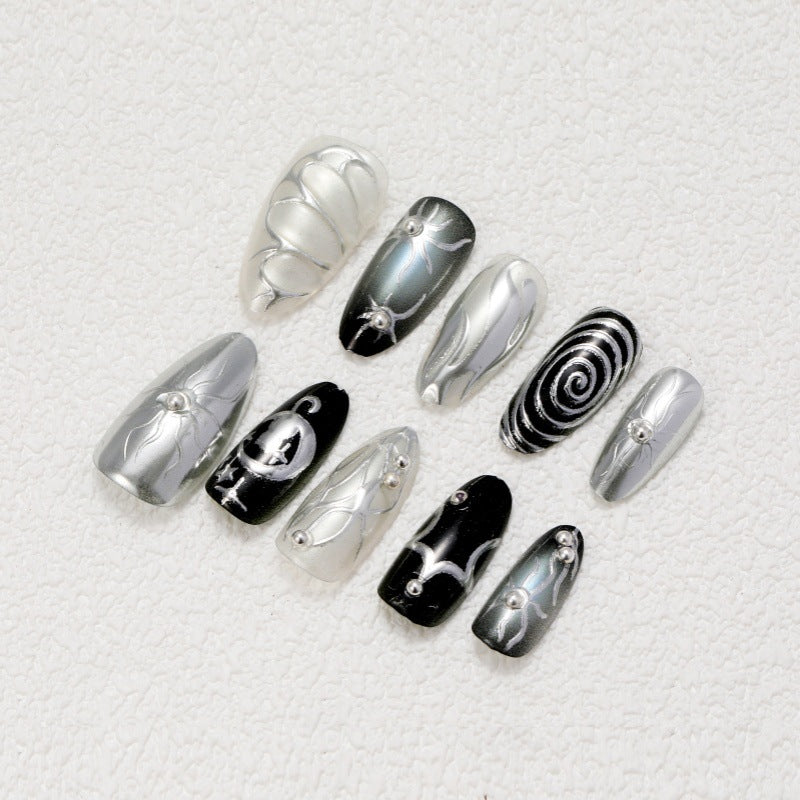 Artificial nails with metallic effects and complex designs Bowlift