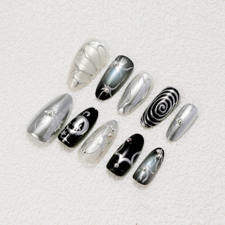 Artificial nails with metallic effects and complex designs Bowlift