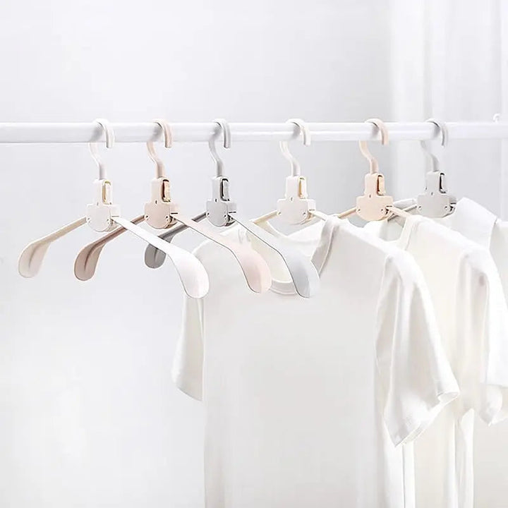 BowLift | Robust foldable clothes hanger with one-button function and crease pRedection