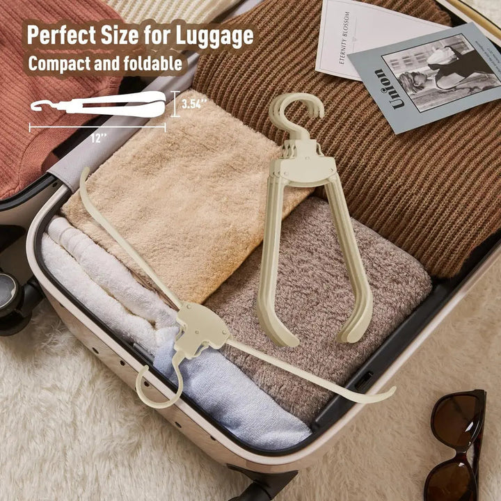 BowLift | Robust foldable clothes hanger with one-button function and crease pRedection