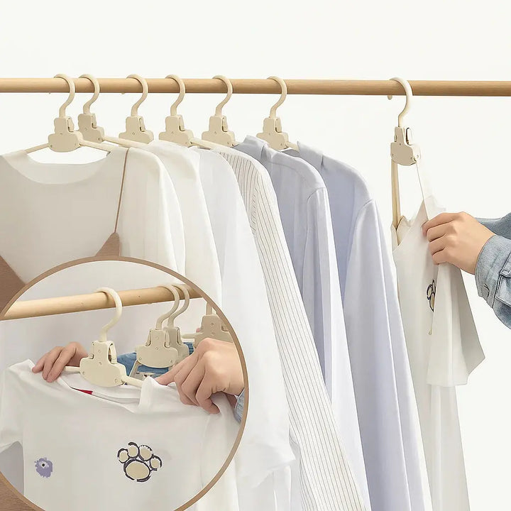 BowLift | Robust foldable clothes hanger with one-button function and crease pRedection