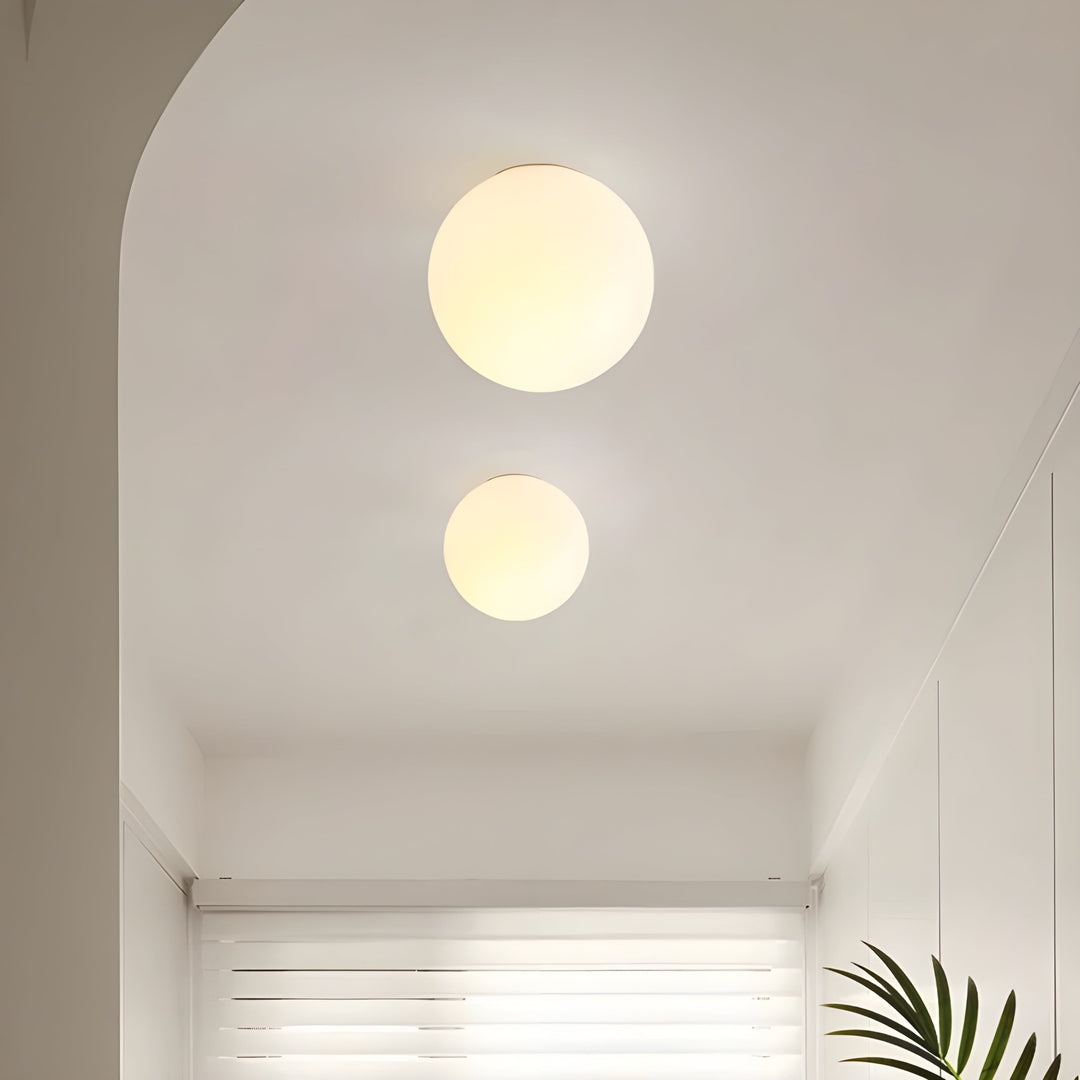 GlasAura Wall Lamp with Matte Glass Ball and Metal Base | Bowlift